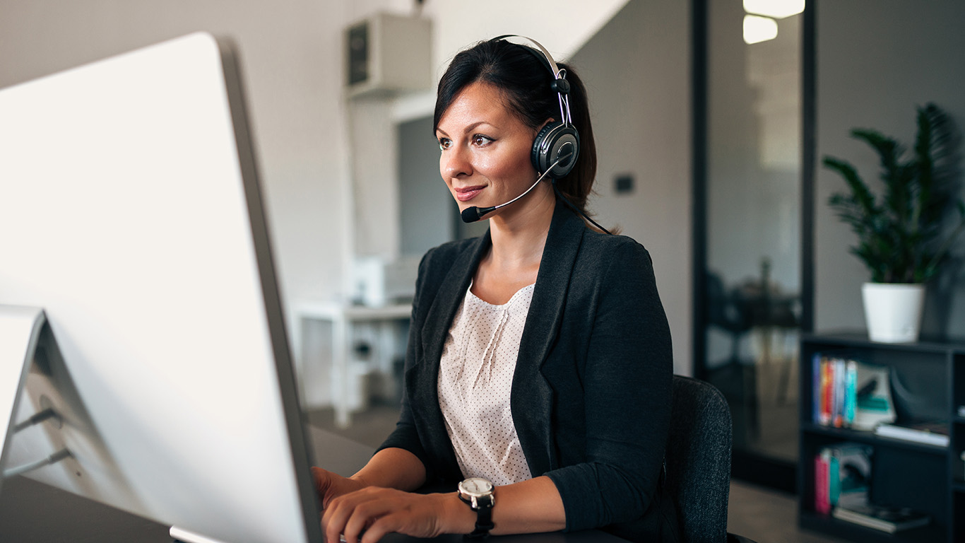 Customer-Service-Agent customer service agent at desktop computer